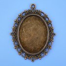 Setting frame for approx. 40x30mm oval cabochons, vintage bronze-coloured. Incl.glass cabochons, 2set