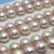 Freshwater pearl, half-drilled, beige, 4,5mm round. Sold per pair