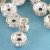 Rhinestone beads, clear, silver-plated, 6x2.5mm, 25 pcs.