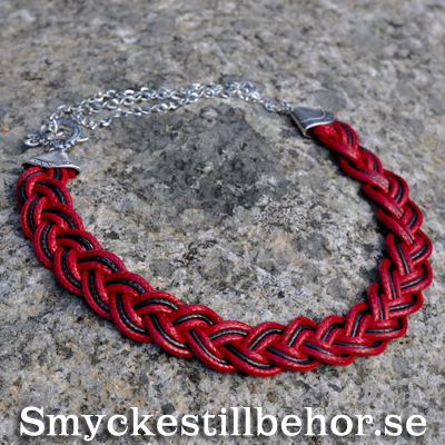 Braided necklace with cords and large ends></a></div><div class=